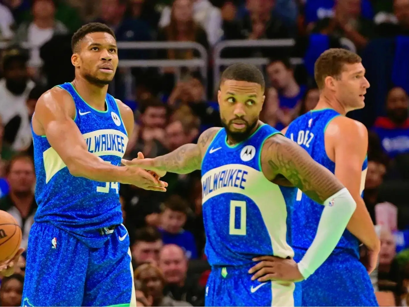 雄鹿力克热火，字母哥砍下双20加上三双